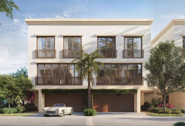 Ancora Residences facade rendering with townhome architecture and landscaping